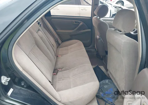 1999 Toyota Camry Le z USA, uszkodzony, nr VIN 4T1BG28KXXU561908